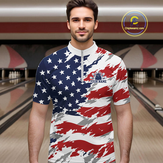 Man wearing a patriotic-themed polo shirt with an American flag design in a bowling alley.
