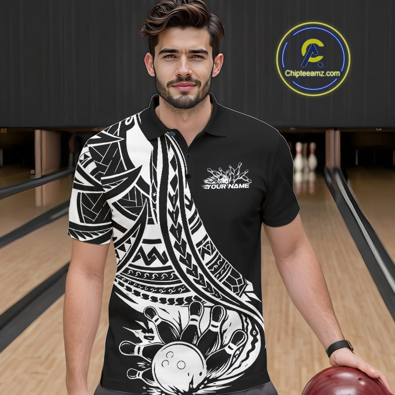 Man wearing a black and white patterned polo shirt in a bowling alley.