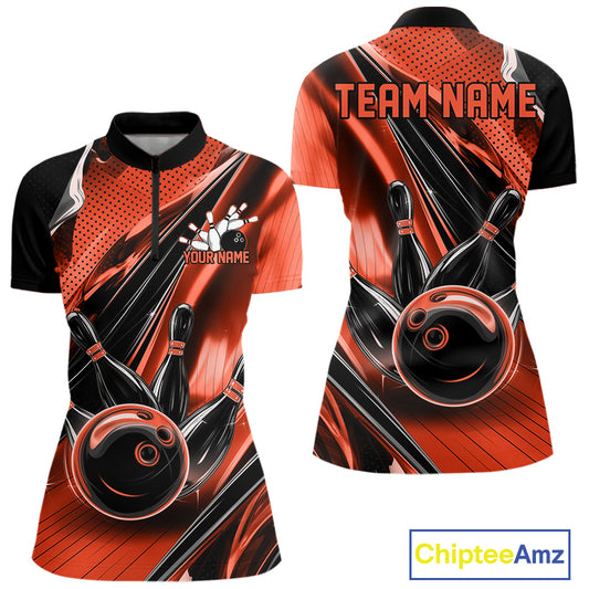 Front and back views of a black and orange womens bowling quarter-zip shirt featuring bowling strike graphics with motion streak accents.