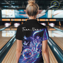 Load image into Gallery viewer, Female model in a black bowling polo with starry galaxy graphics, glowing neon swirls, and hologram butterflies, back view