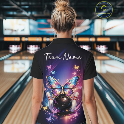 Back view of a female model in a bowling venue wearing a colorful polo shirt featuring luminous butterflies and cosmic bowling graphics.