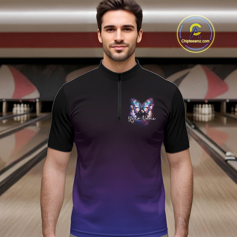 Male model wearing a colorful bowling quarter-zip shirt at a bowling lane with glowing butterflies, a bowling ball centerpiece, and cosmic artwork.