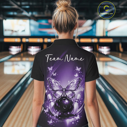 Back view of a female model in a bowling venue wearing a purple quarter-zip shirt featuring glowing butterflies and a cosmic bowling theme.