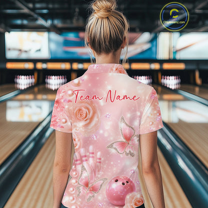 Back view of a female model in a bowling center wearing a quarter-zip shirt with glitter butterflies, diamonds, bowling pins, and bowling-themed accents.