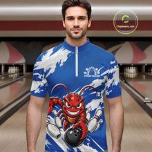 Load image into Gallery viewer, Front view of a male model in a bowling alley wearing a blue custom quarter zip bowling shirt with an aggressive crawfish bowling design and a distressed background.