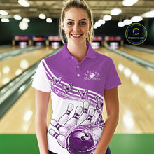 Load image into Gallery viewer, Front view of a female model wearing a white and purple bowling polo with butterfly artwork and bowling graphics inside a bowling center