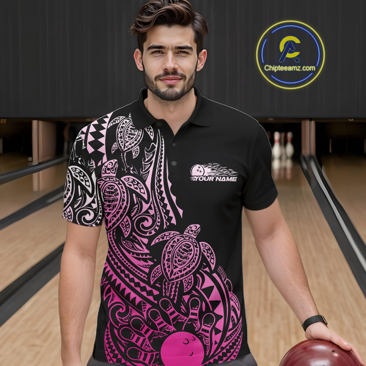 Male model wearing a black and pink bowling polo shirt at the bowling lane with tribal-inspired bowling artwork.