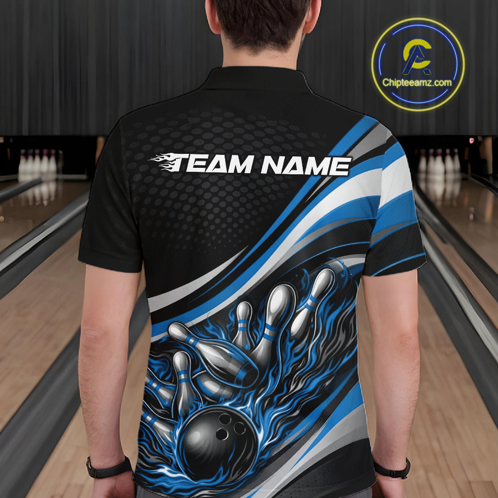 Back view of a male bowler wearing a black and blue polo shirt, flame bowling strike artwork with dynamic pin impact design.