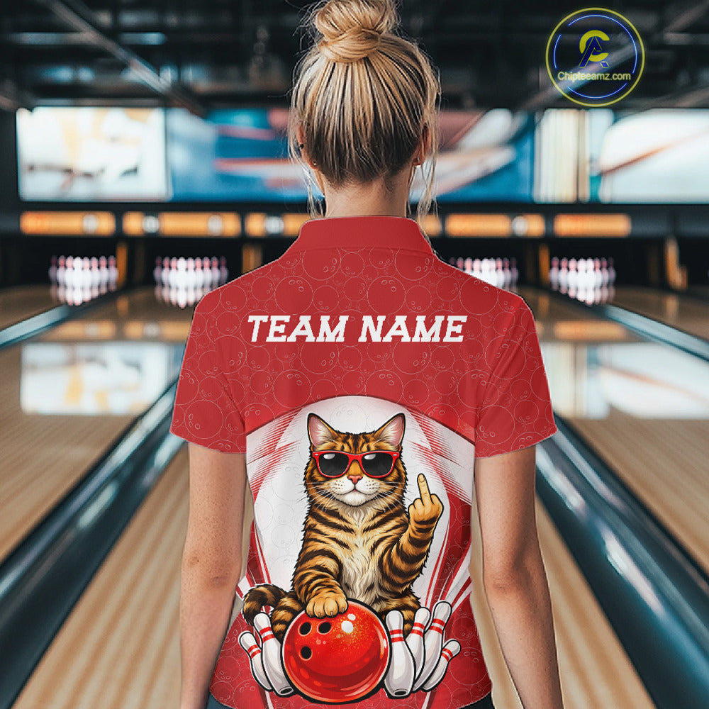 Back view of a female model in a bowling venue wearing a white and red polo shirt featuring a golden brown Bengal cat and bowling ball motif.