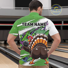 Load image into Gallery viewer, Back view of a male model in a bowling alley wearing a green custom quarter zip bowling shirt with a funny graffiti turkey holding a bowling ball, paint splatter accents, and a personalized name.