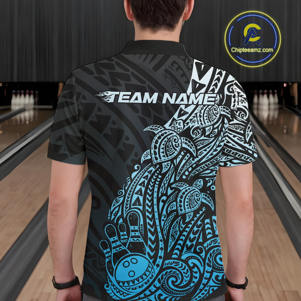 Back view of a male model in a black and blue bowling polo shirt showcasing tribal-inspired bowling artwork and turtle motifs.