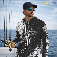 Load image into Gallery viewer, Man on a boat wearing a black and white long-sleeve shirt with 'Skeleton Fish' design, looking out at the ocean.