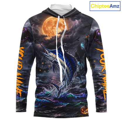 A long-sleeve hoodie with an all-over Halloween-themed graphic print featuring a jumping marlin, stormy seas, a full moon, and orange text down the sleeves, shown on a white background with a ChipteeAmz logo in the top right corner.