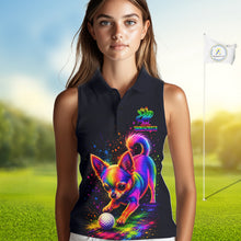 Load image into Gallery viewer, Woman wearing a sleeveless black golf shirt with a colorful dog design on a golf course.