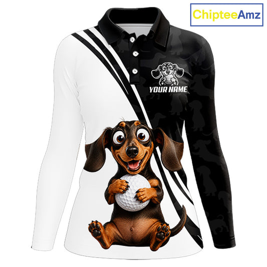 A long-sleeve polo shirt with a split white and black design, featuring a cartoon dachshund holding a golf ball on the front. The right side of the shirt has a black camouflage pattern with a custom logo placeholder and the text 'YOUR NAME'.