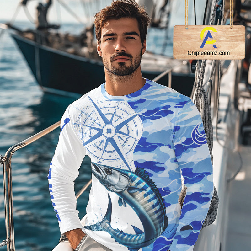 A man wearing a wahoo fishing shirt long sleeve with custom name on the sleeve.