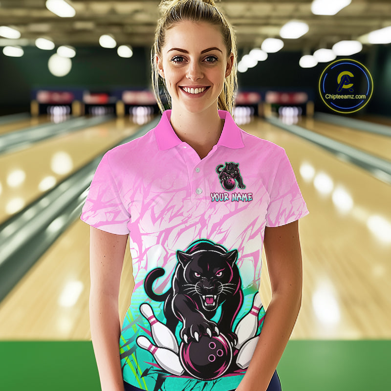 Bowler wearing custom pink and turquoise leopard bowling shirt on the lanes