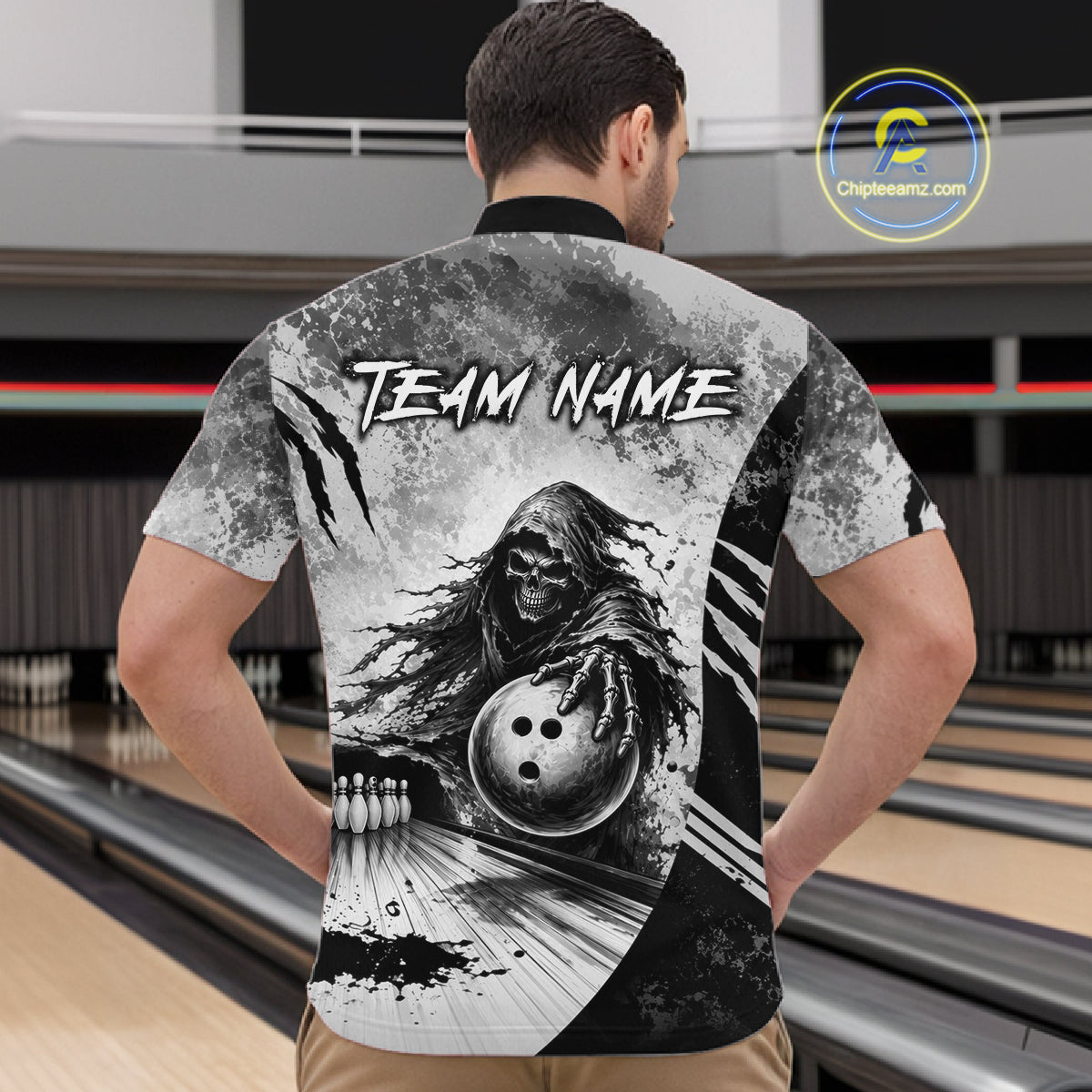 Bowler wearing custom gray camo skeleton Grim Reaper bowling quarter zip shirt on the lanes - back view
