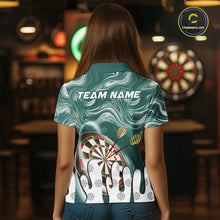 Load image into Gallery viewer, Back view of woman wearing a green marble swirl darts shirt.