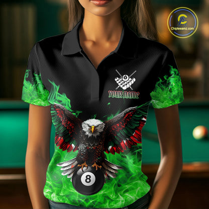 Woman wearing a green flame eagle skull billiard jersey beside a pool table front view.