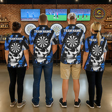 Load image into Gallery viewer, Back view of darts players wearing matching blue camo skull darts shirts at a competition venue.