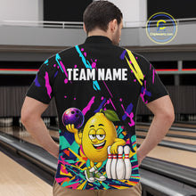 Load image into Gallery viewer, Back view of man wearing a colorful lemon bowling quarter zip shirt in a bowling alley.