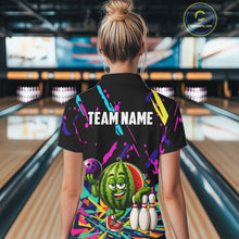 Load image into Gallery viewer, Back view of woman wearing a colorful watermelon bowling polo shirt inside a bowling alley.