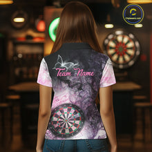 Load image into Gallery viewer, Back view of woman wearing a pink butterfly smoke darts shirt.