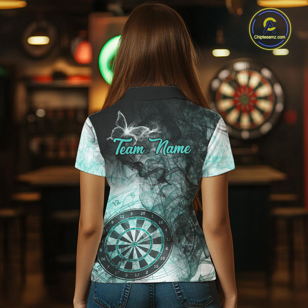 Back view of woman wearing a turquoise butterfly smoke darts shirt.