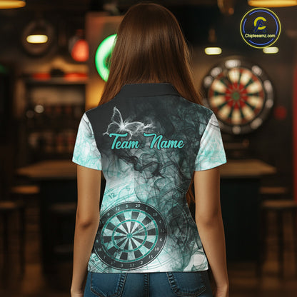 Back view of woman wearing a turquoise butterfly smoke darts shirt.