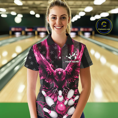 Woman wearing a pink lightning eagle bowling polo shirt at a bowling alley front view.