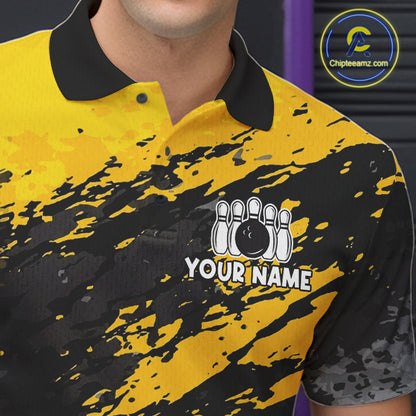 Close-up of a yellow banana grunge bowling polo shirt collar, buttons, and funny artwork.