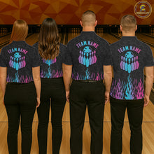Load image into Gallery viewer, Back view of bowling team wearing matching fire flame bowling shirts in a bowling alley.
