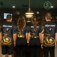 Load image into Gallery viewer, Back view of pool players wearing matching cobra snake and dragon billiard shirts in a game room.