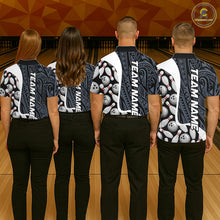 Load image into Gallery viewer, Back view of bowling team wearing matching blue tribal bowling shirts in a bowling alley.