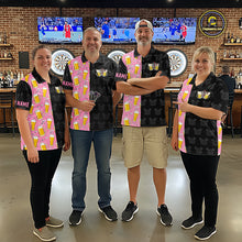 Load image into Gallery viewer, Darts team wearing matching pink and black darts and beer darts jerseys during league competition front view.