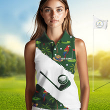 Load image into Gallery viewer, Woman wearing parrot palm tree golf sleeveless polo shirt on sunny golf course