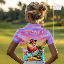Load image into Gallery viewer, Woman wearing flamingo island golf polo shirt on golf course
